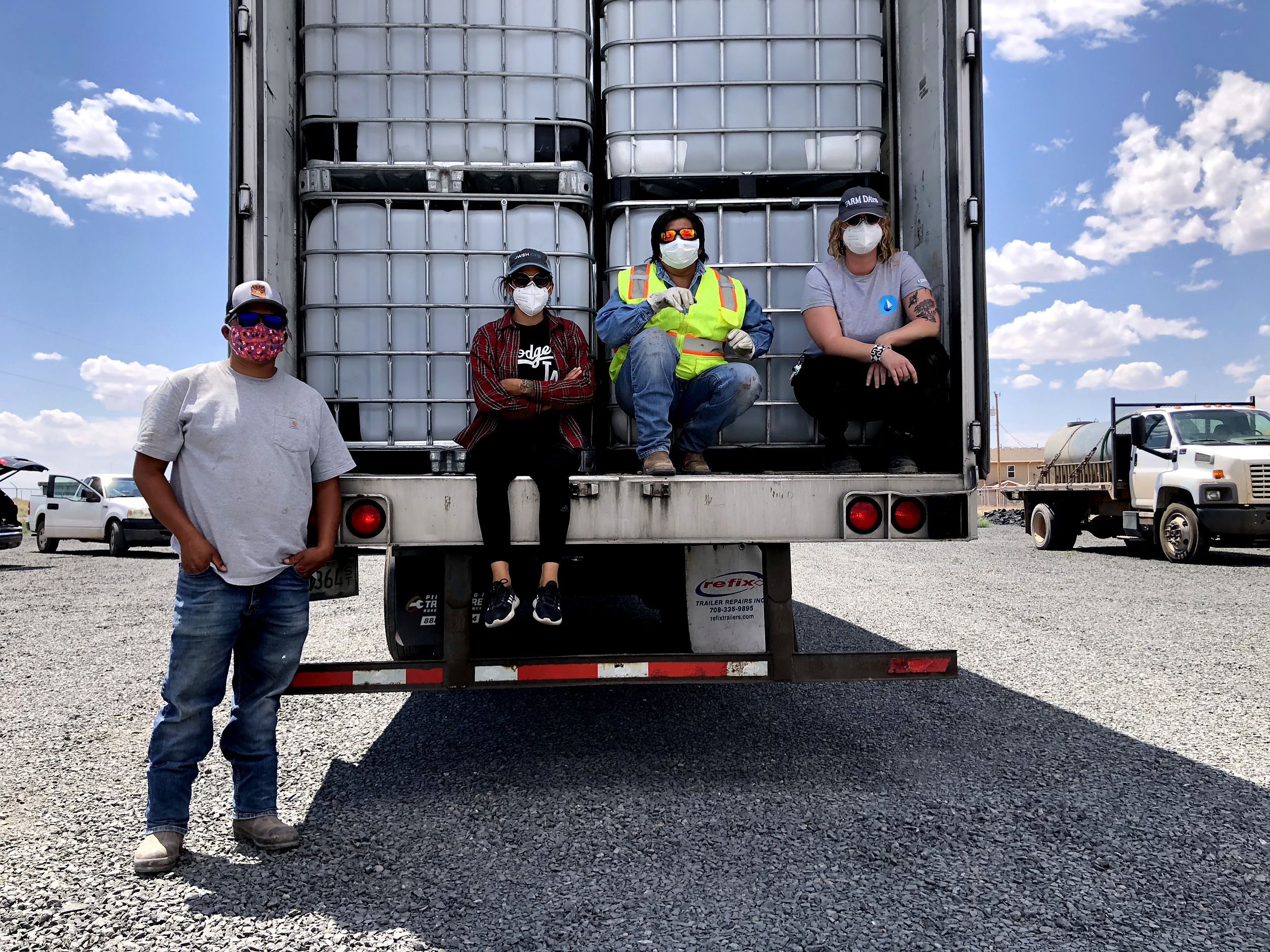 Emma Robbins, second from left, is the director of the Navajo Water Project for the non-profit DigDeep. 